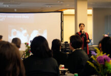 Asst. professor shares her ‘steminism’ story for SLCC event tackling STEM gender gap Dalia Salloum stands in front of audience while giving a presentation