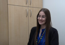 Dietitian reviews student answers to nutrition questions Carly Alba answering questions