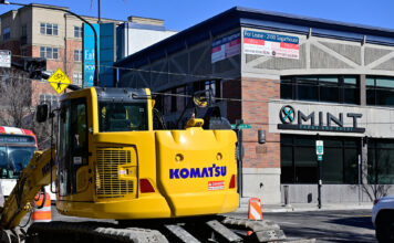 Reconstruction of 2100 South in Sugar House aims to increase access, safety Komatsu excavator at the corner of 2100 S and McClelland St.