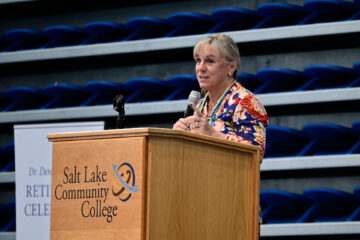 Remembering 10 years of leadership: SLCC hosts retirement celebration for President Deneece Huftalin Deneece Huftalin speaking to attendees from behind a podium