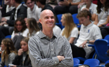 SLCC men’s basketball head coach Kyle Taylor leaves after five record-breaking years Coach Kyle Taylor smiling with arms crossed
