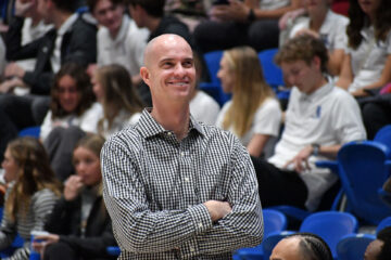 SLCC men’s basketball head coach Kyle Taylor leaves after five record-breaking years Coach Kyle Taylor smiling with arms crossed