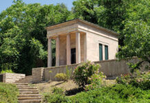 Remembering Utah’s WWII veterans at Meditation Chapel Stone building surrounded by trees and shrubbery