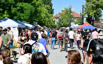 Here are some options for recreation in and around Salt Lake City this summer Crowd of people navigating a farmers market under blue skies