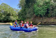 SLCC study abroad opportunities take students around the world Multiple people navigating a river on a blue raft