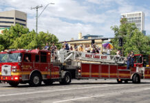 Utah’s 2024 Pride Parade weaves through downtown Salt Lake City, fostering alliances Salt Lake City fire truck on the parade route