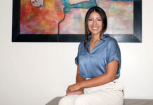 Letter from SLCCSA: 2024-2025 vision statement Nahomi Rei Pena seated underneath a painting