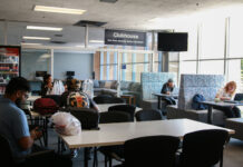 HB 261 changes the campus at Utah State University, students react Students sitting at tables near USUSA clubhouse