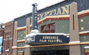Upcoming 2025 Sundance Film Festival offers two ticket packages for young adults Snow falling in Park City outside Egyptian Theatre