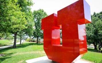 University of Utah students voice their thoughts on democracy Large red block letter U standing on a college campus
