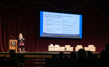 Facebook whistleblower Frances Haugen speaks at SLCC on social media regulation Frances Haugen giving a presentation on stage
