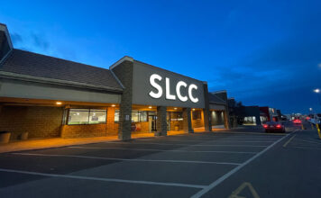 Law students answer immigration questions through help sites SLCC West Valley Center lit up at dusk