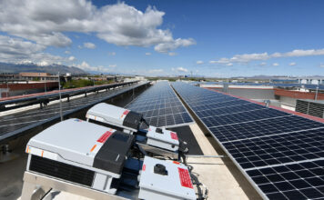 How SLCC is expanding sustainability efforts across its campuses Solar array charging under a blue sky