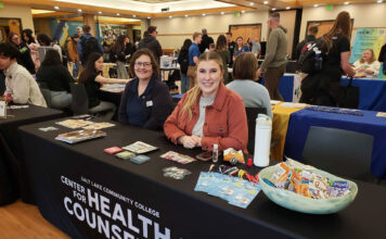 SLCC health center to host ‘Spread Love, Not STIs’ event Peggy Fisher, left, and Madison Gregory sitting at a table for the Center for Health and Counseling