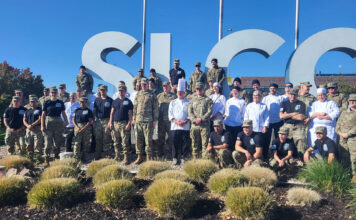 Culinary collaboration celebrates veterans at SLCC A group photo of student chefs, faculty and military personnel