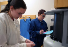 SLCC’s dental hygiene program rooted in student success Dental hygiene student and instructor working in the clinic