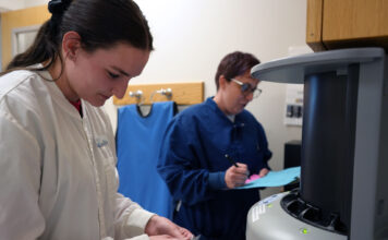 SLCC’s dental hygiene program rooted in student success Dental hygiene student and instructor working in the clinic