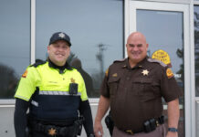 How students can utilize campus safety services UHP Trooper Williams and Lt. Winward standing outside the Gunderson Building