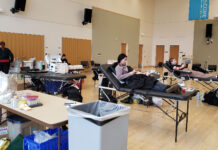 SLCC students donate blood to American Red Cross Blood drive occurring in a large forum
