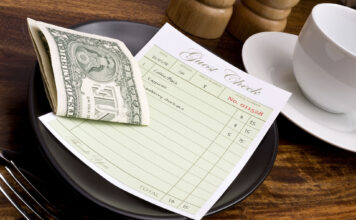 Commentary: The customer service slump Guest check with cash in cafe
