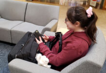 SLCC students share what it means to be ‘chronically online’ and offer a glimpse into personal habits Young women browsing videos on her smartphone