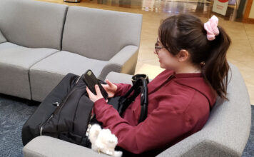 SLCC students share what it means to be ‘chronically online’ and offer a glimpse into personal habits Young women browsing videos on her smartphone