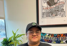 SLCC students comment on finding balance between work and college Tricio Salgado standing in an office