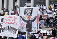 Photos: Utahns protest at the Capitol Protesters holding signs at the Capitol