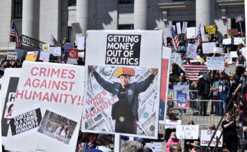 Photos: Utahns protest at the Capitol Protesters holding signs at the Capitol