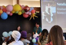 SLCC clubs unite, create new ceremony to celebrate student graduates Natalie and Fernando speaking to a seated audience