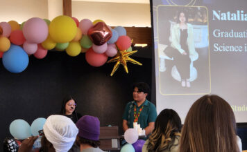 SLCC clubs unite, create new ceremony to celebrate student graduates Natalie and Fernando speaking to a seated audience