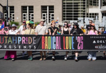 35th Utah Pride Parade defies obstacles to entertain thousands Parade participants hold “Radical Love '25” event banner to start parade