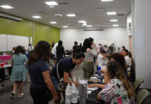 SLCC’s ‘Together We Thrive’ event uplifts community Guests interacting with organizations at a resource fair