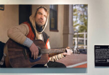 Stories through photographs, and the humanity therein Photo of Casey playing a guitar with a description of his story being displayed on a wall