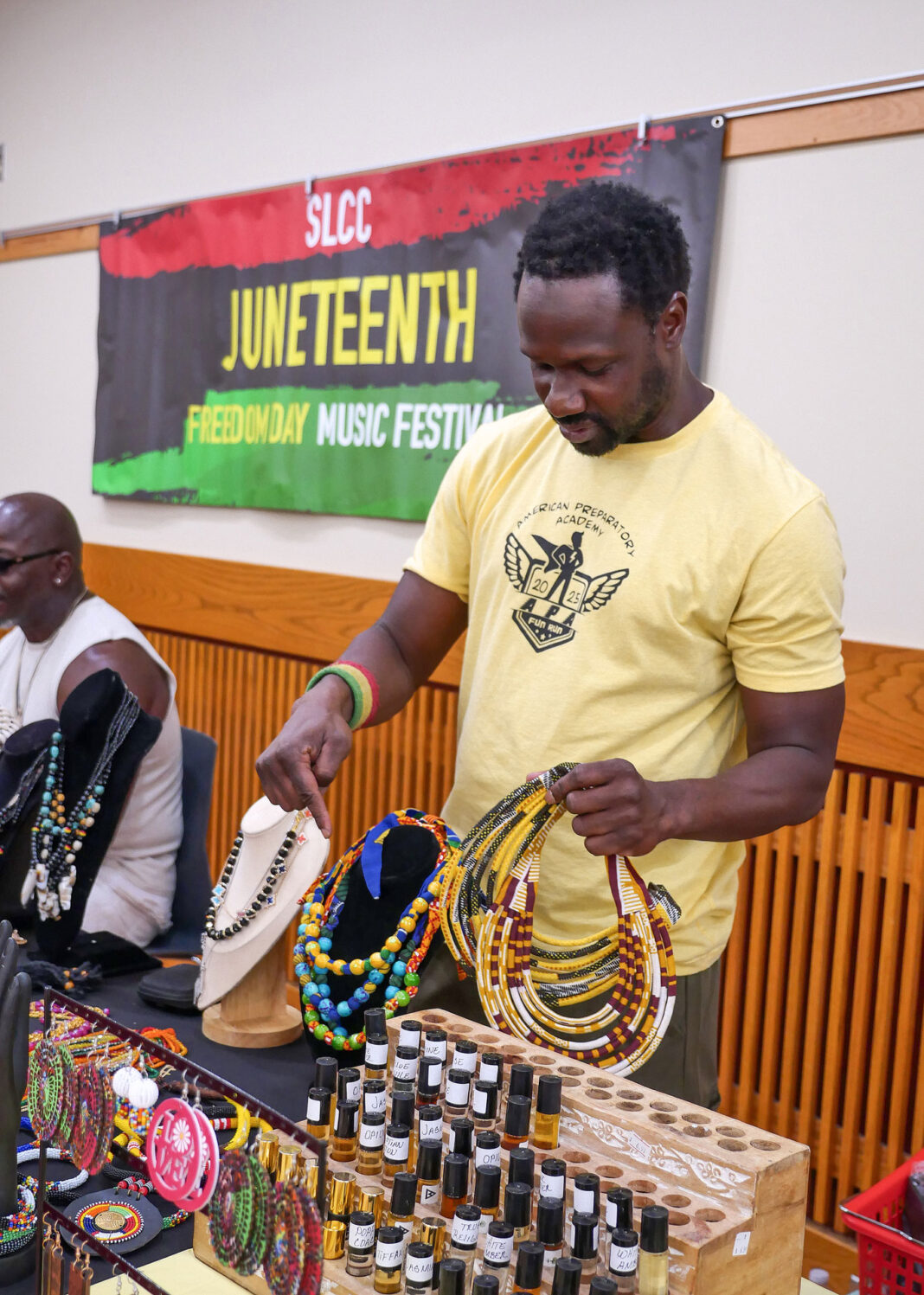 Jack Hezleopo arranging his handmade jewelry
