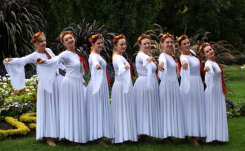 Photos: Folk Festival at International Peace Gardens Dancers wearing white dresses and red floral headbands