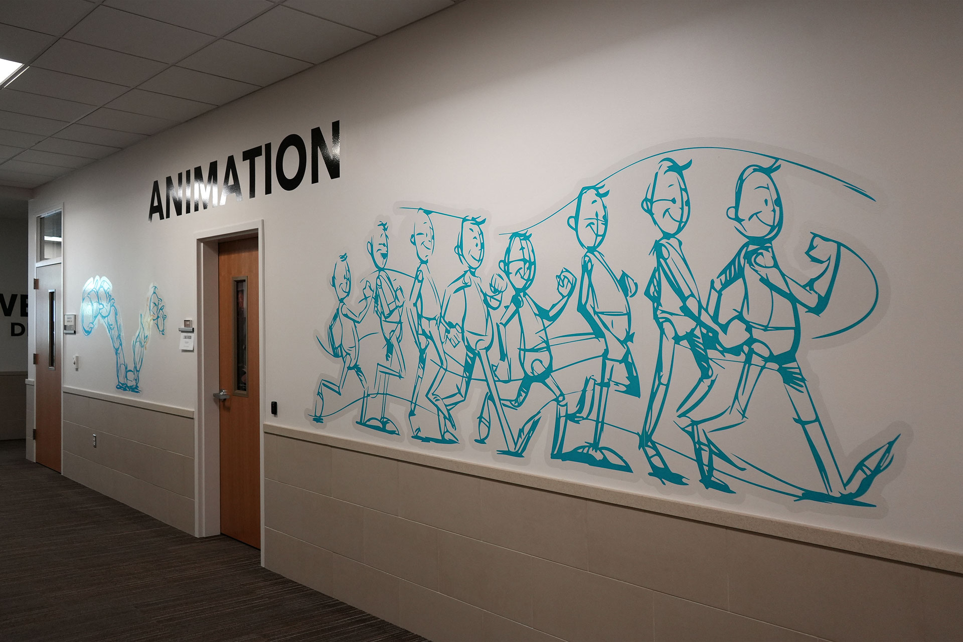 Wall art decorating hallway outside the animation classroom