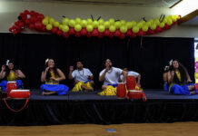 Pacific Unity Association: A ‘rock’ for SLCC’s Pacific Islander students Pacific Islander men and women seated on a stage playing drums
