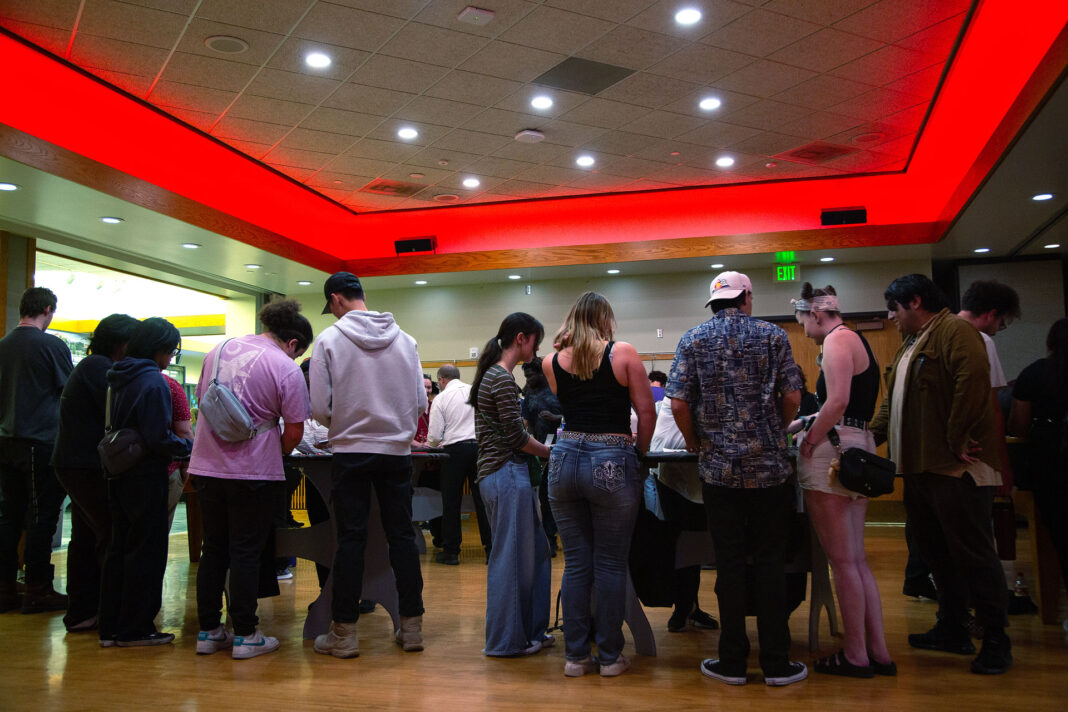 Several people playing casino games in the Student Center