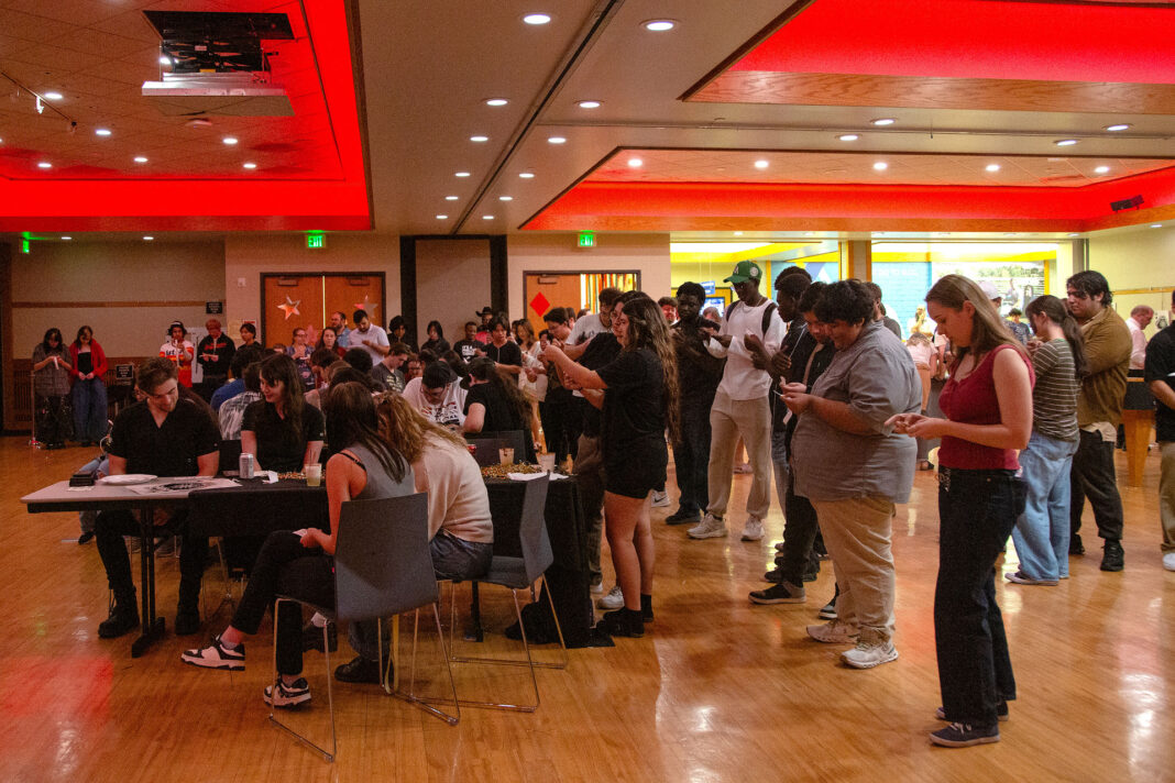 Dozens of people awaiting raffle results in the Student Event Center