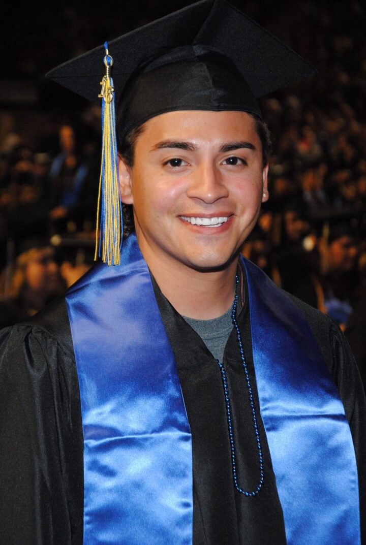 Jesse Valdez wearing cap and gown