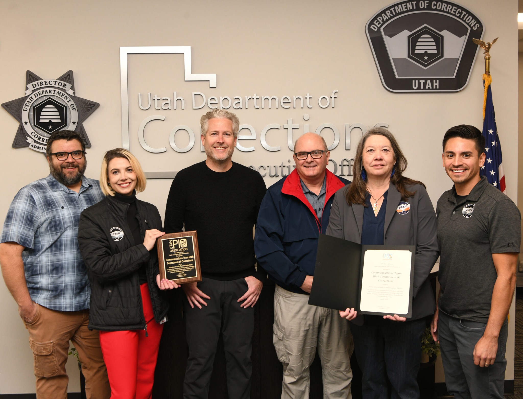 Jesse standing with other UDC staffers