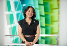 Student association president hopes to bridge communication gap through active listening Roena standing inside the AAB at Redwood