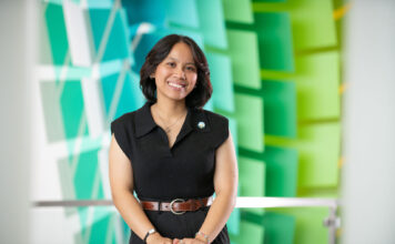 Student association president hopes to bridge communication gap through active listening Roena standing inside the AAB at Redwood