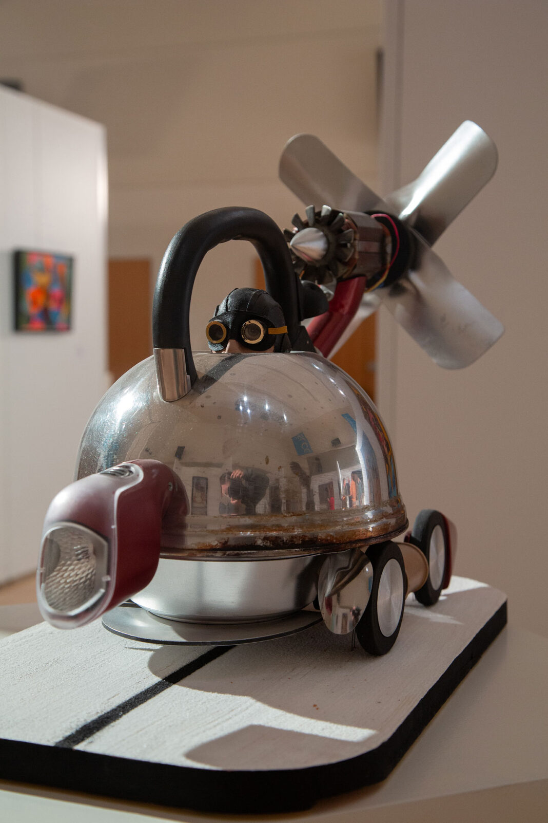 Metal sculpture on display in an art gallery