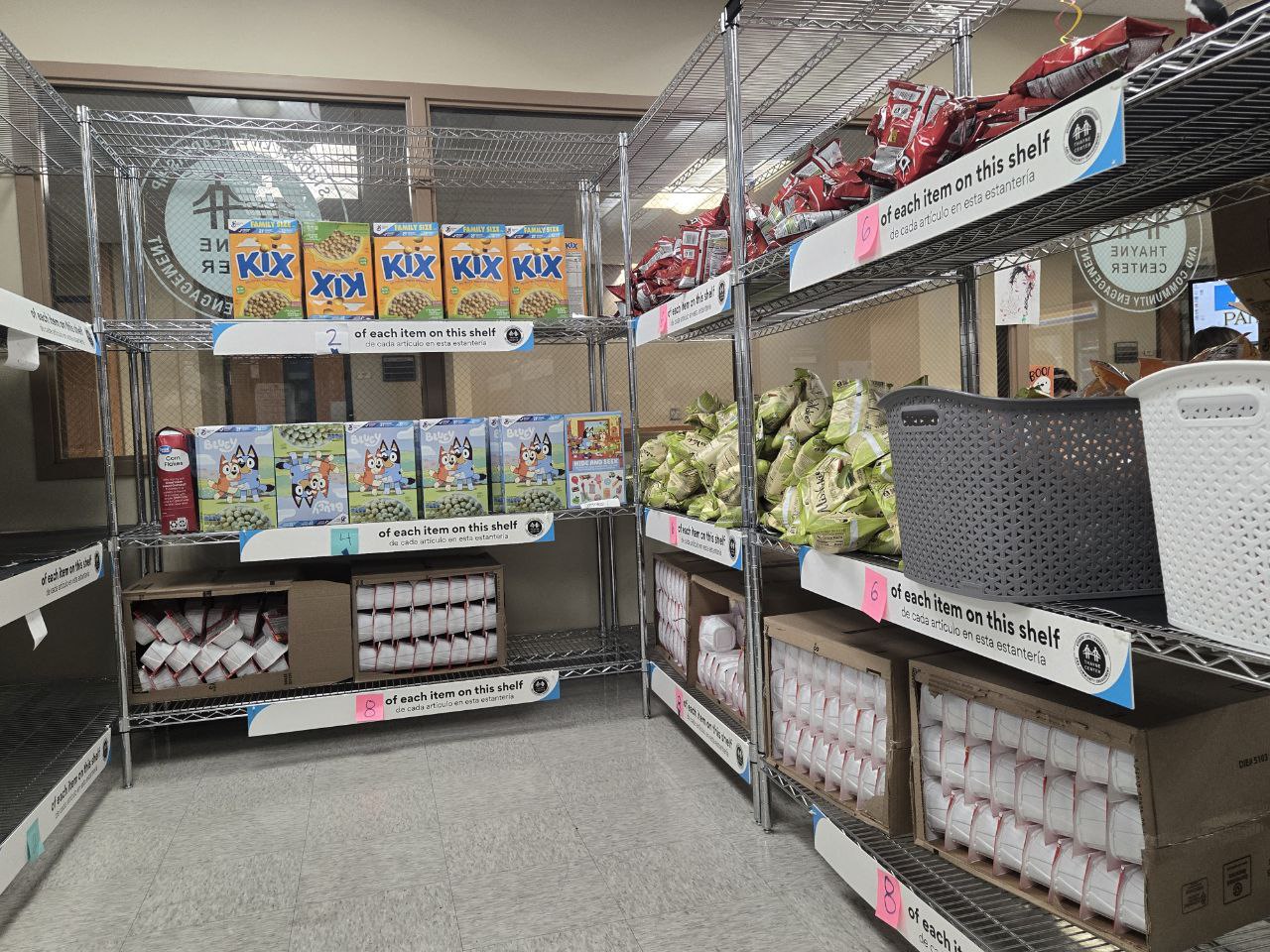 Boxed and canned food items lining pantry shelves