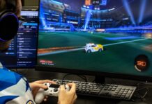 SLCC esports team loses scholarship access esports player using a controller in front of monitor displaying "Rocket League" gameplay