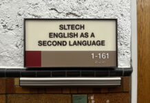 Breaking language barriers with the help of the English as a Second Language program Sign reads "SLTECH ENGLISH AS A SECOND LANGUAGE 1-161"