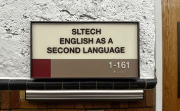 Breaking language barriers with the help of the English as a Second Language program Sign reads "SLTECH ENGLISH AS A SECOND LANGUAGE 1-161"