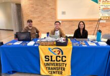 National Transfer Student Week bridges gap between students and the transfer process Three transfer staffers seated at a table waiting to assist students